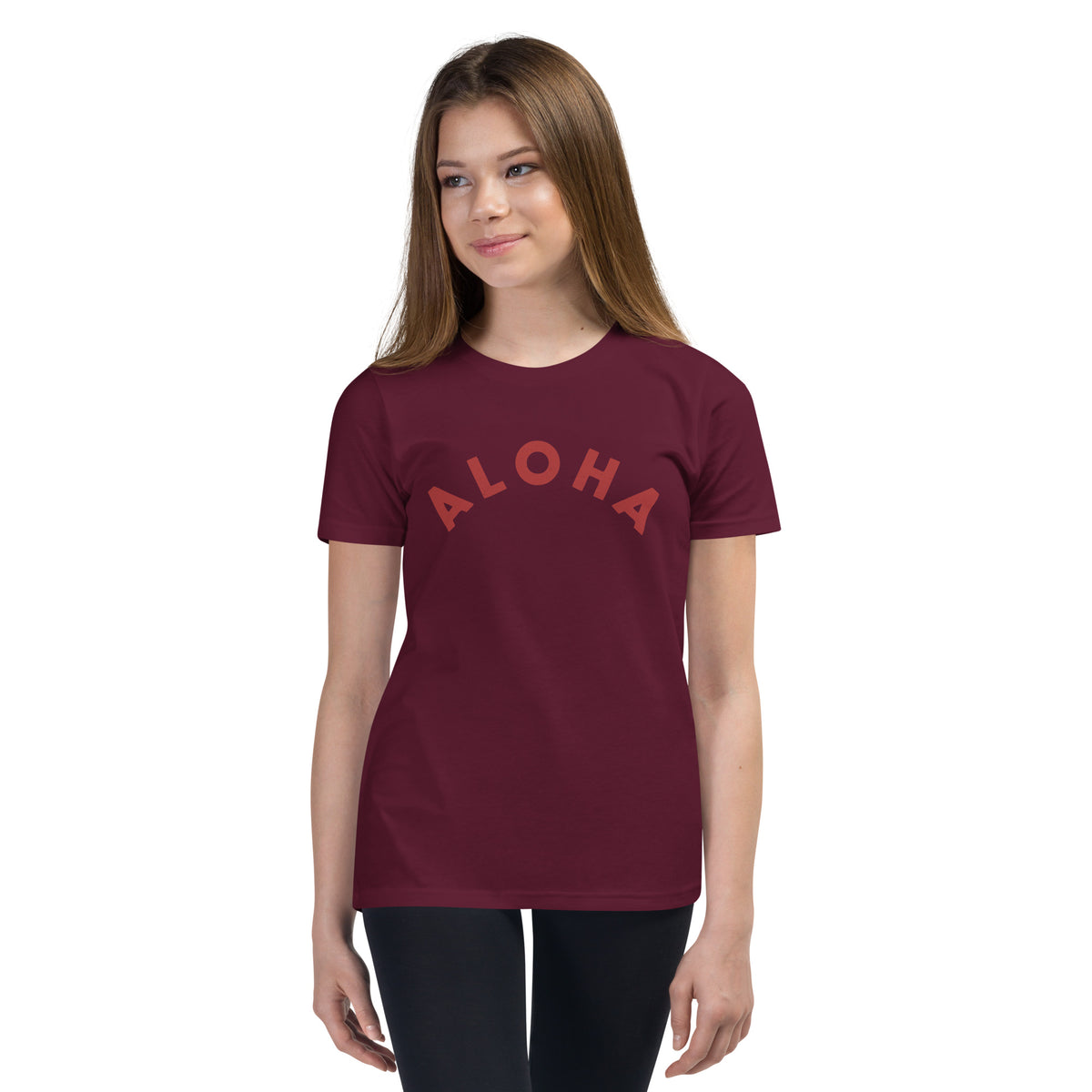 "Aloha" in clean vintage Hawaiian lettering, printed on a SodaPop Cool kids t-shirt.