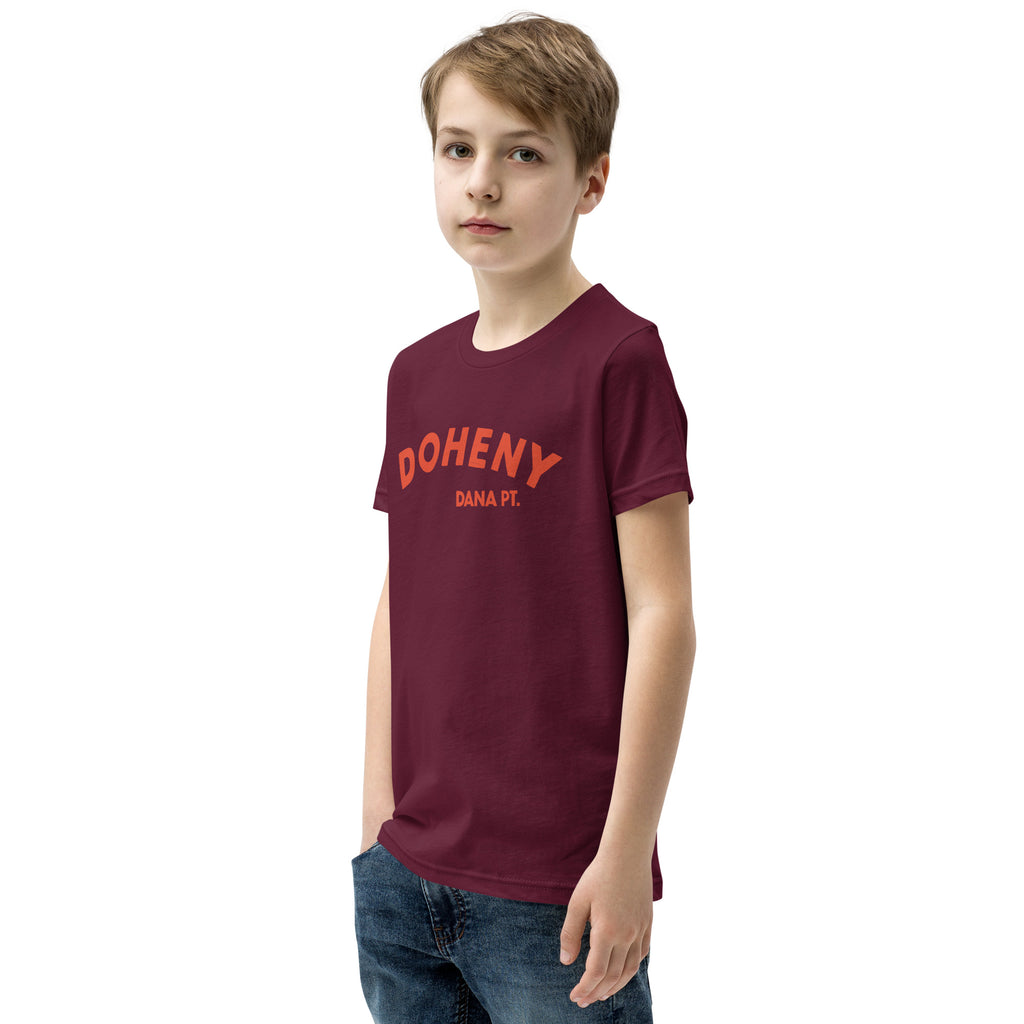 "Doheny Dana Point" in vintage California surf lettering, printed on a SodaPop Cool kids t-shirt.