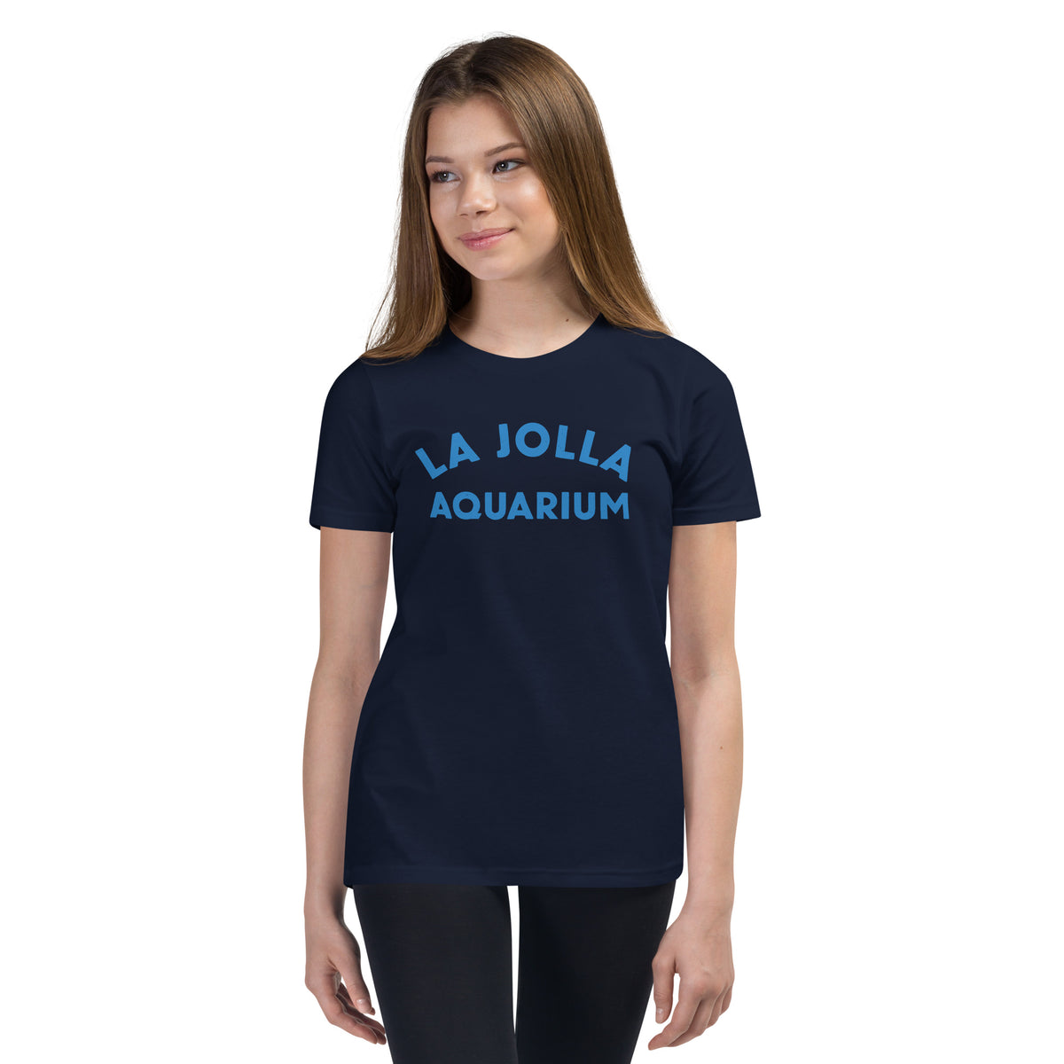 "La Jolla Aquarium" in classic vintage type, printed on a SodaPop Cool kids t-shirt.